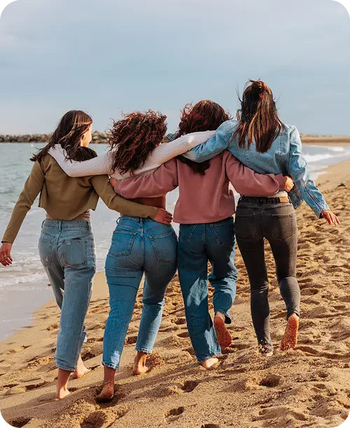 Women travellers on a beach
